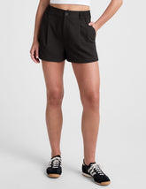 black 4" inseam shorts with an elastic waistband with belt loops and side seam pockets.
